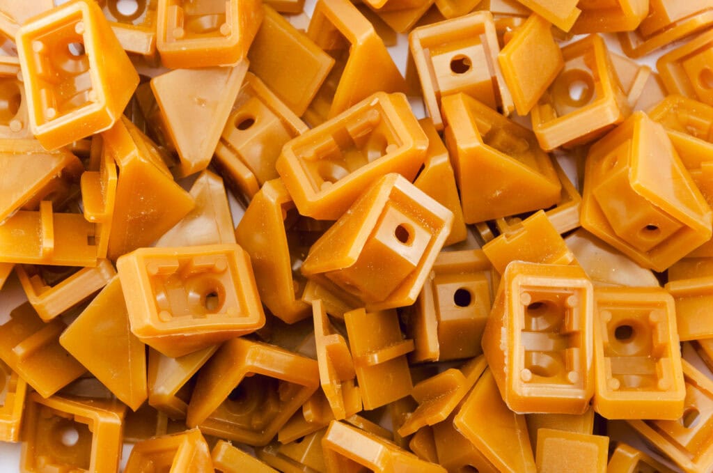 Injection moulded orange corner brackets