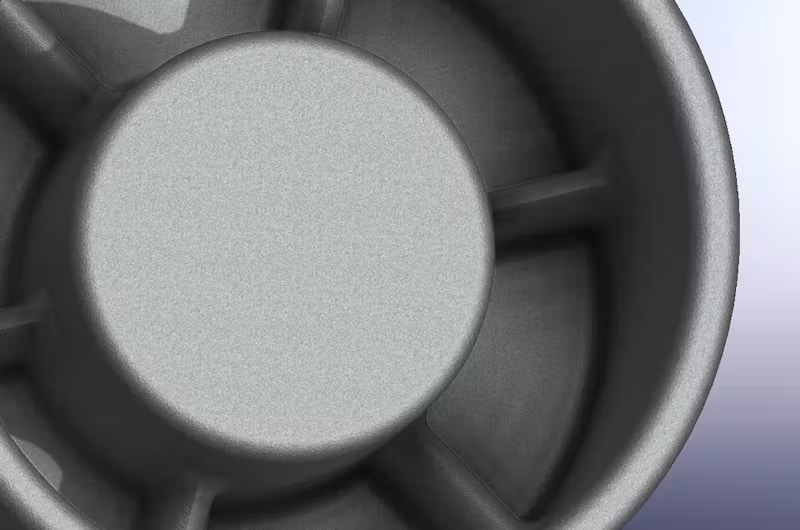 Part with ribs and metal saving features