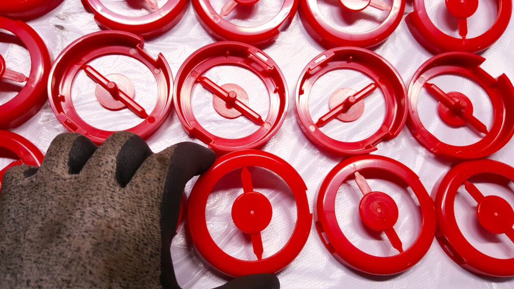 Red round injection molded parts