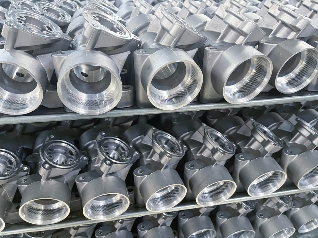 Top view of a complex aluminum die cast housing with ribs, bosses, and uniform wall thickness.