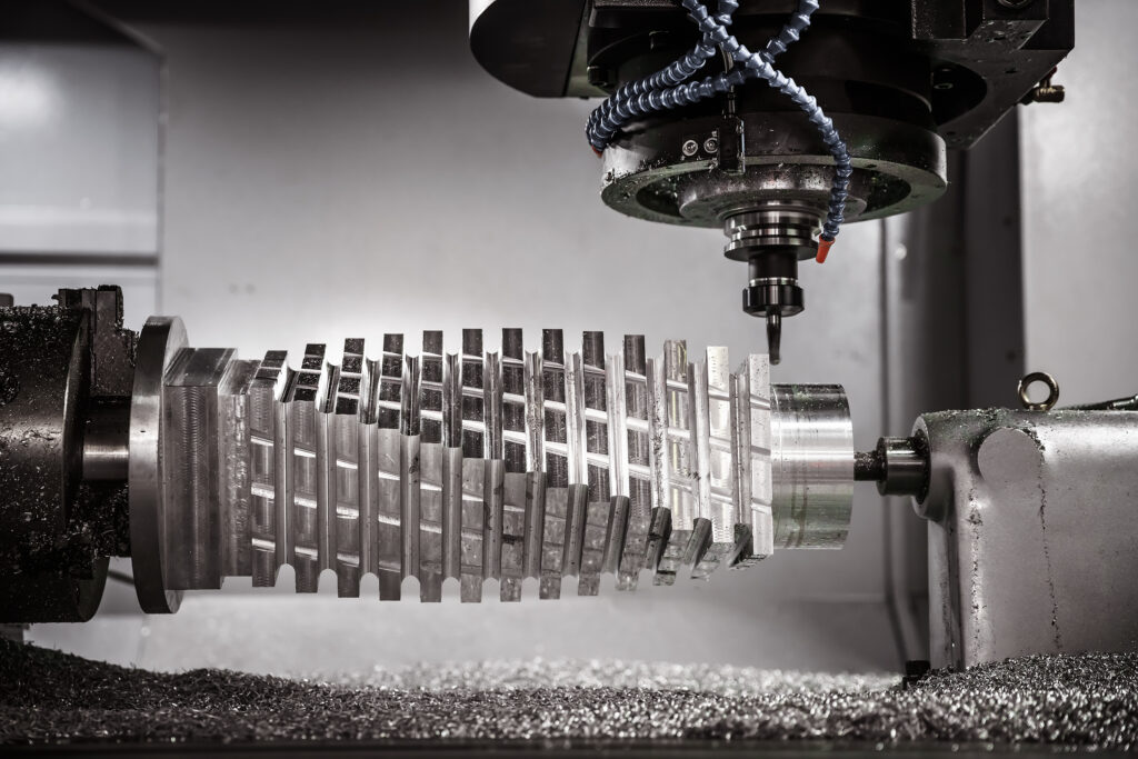 CNC milling machine machining a large helical metal rotor with precision cutting operations.