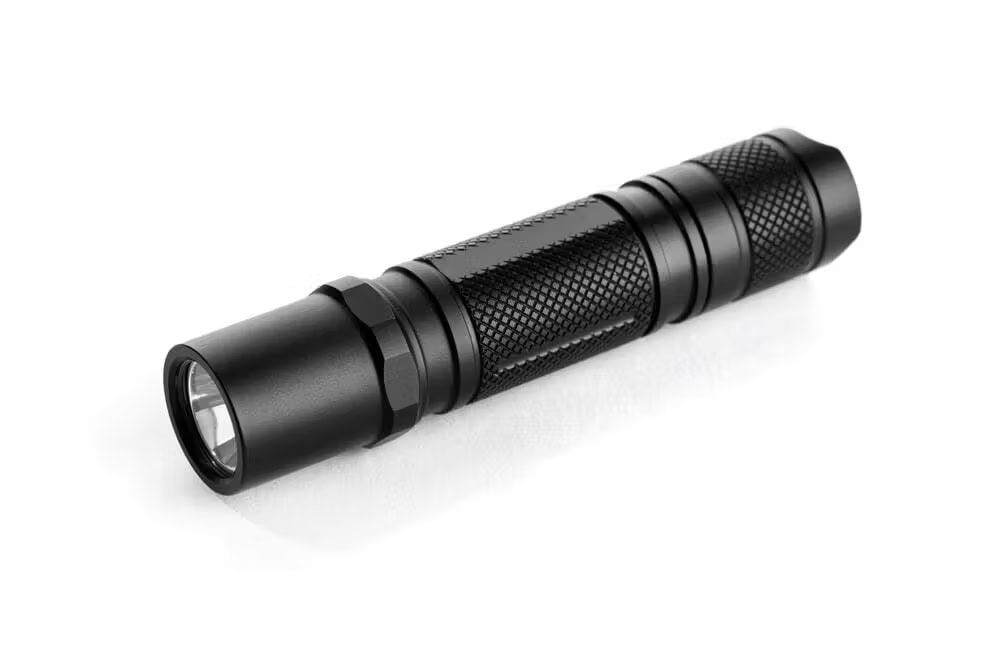 A black anodised flashlight