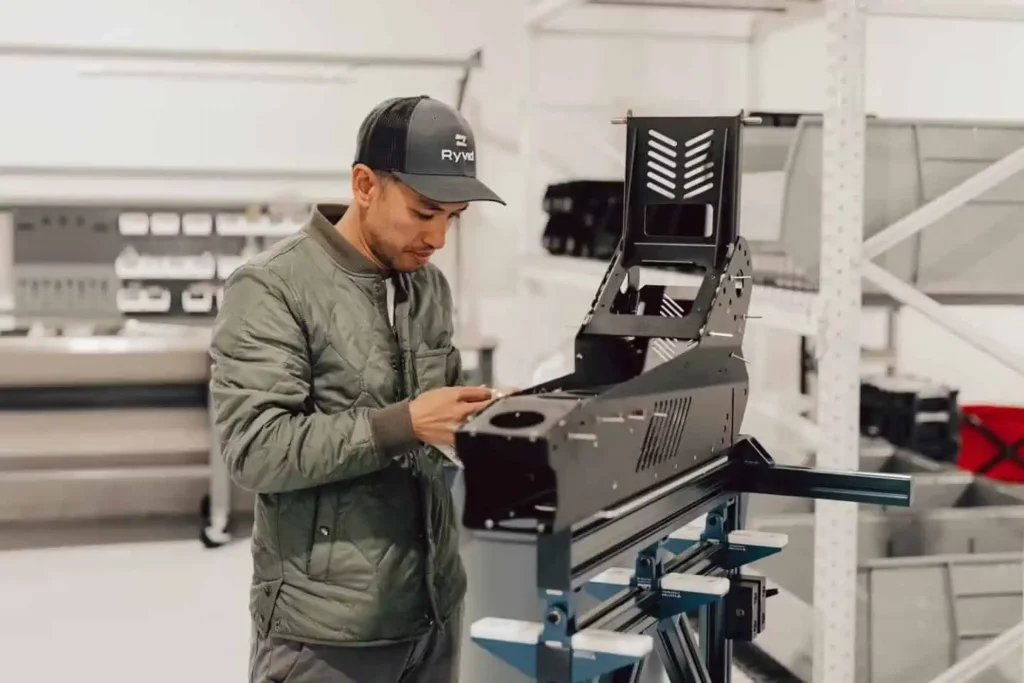 Ryvid team working on the frame