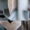 Sheet metal bending machine closeup