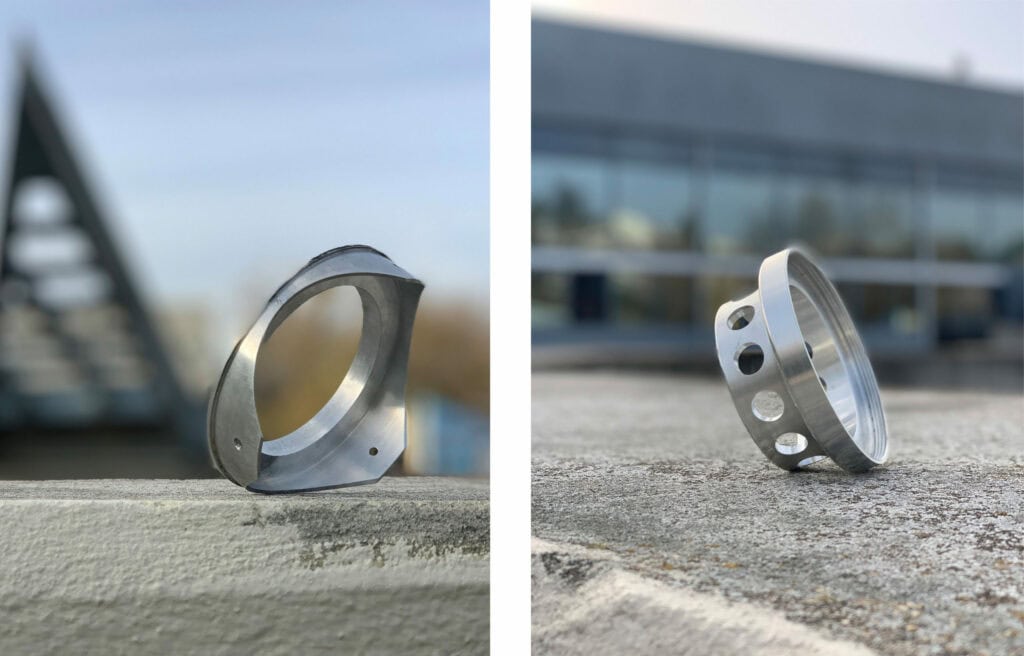 CNC machined bulkhead and retainer for rocket motor produced via Xometry © ASAT