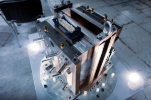Top view of a complex injection mold used in plastic manufacturing