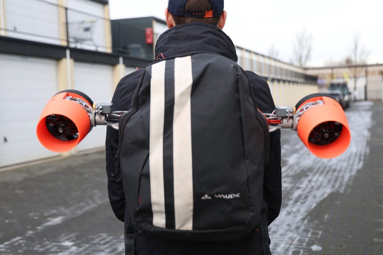 The completed booster backpack, featuring sleek 3D-printed components and deployable arms, ready for real-world application.