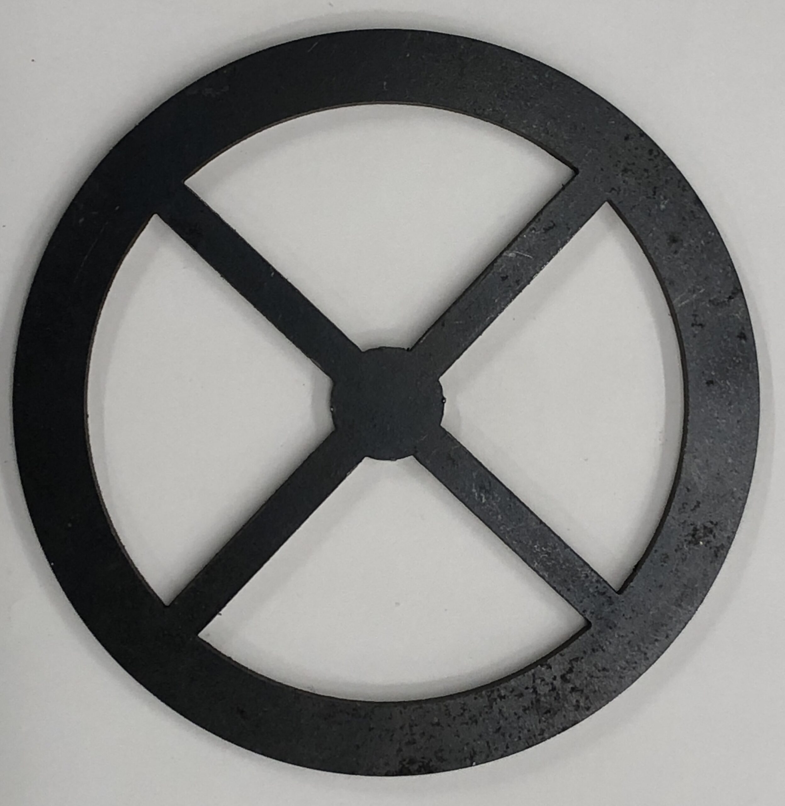A steel wheel produced using waterjet cutting by Xometry, replicating the intricate design of the Barentsz Clock’s original components.