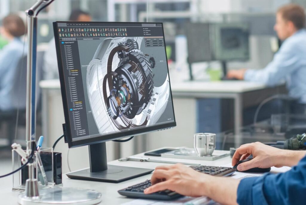 Engineer designing a mechanical component using CAD software