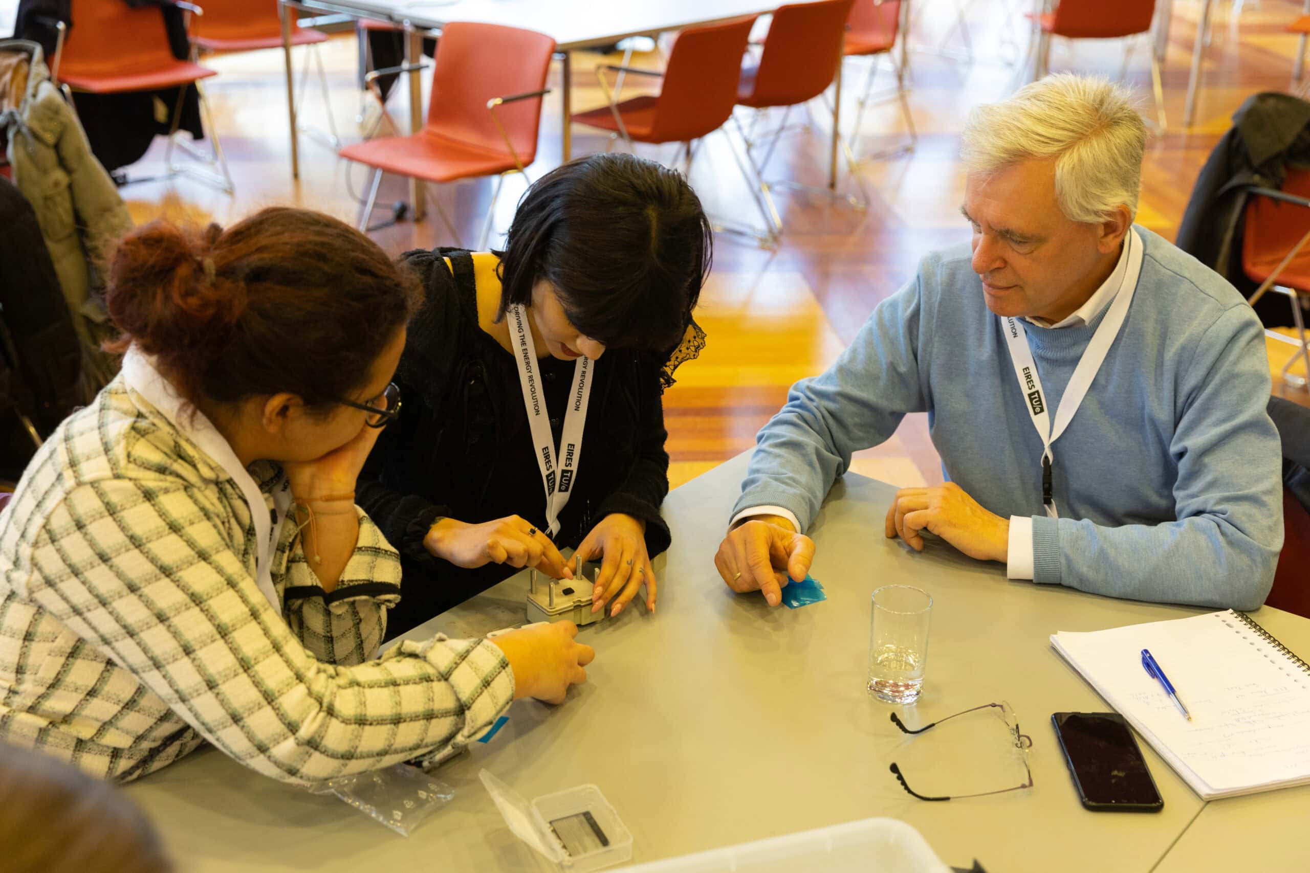 Workshop participants assembling a cell