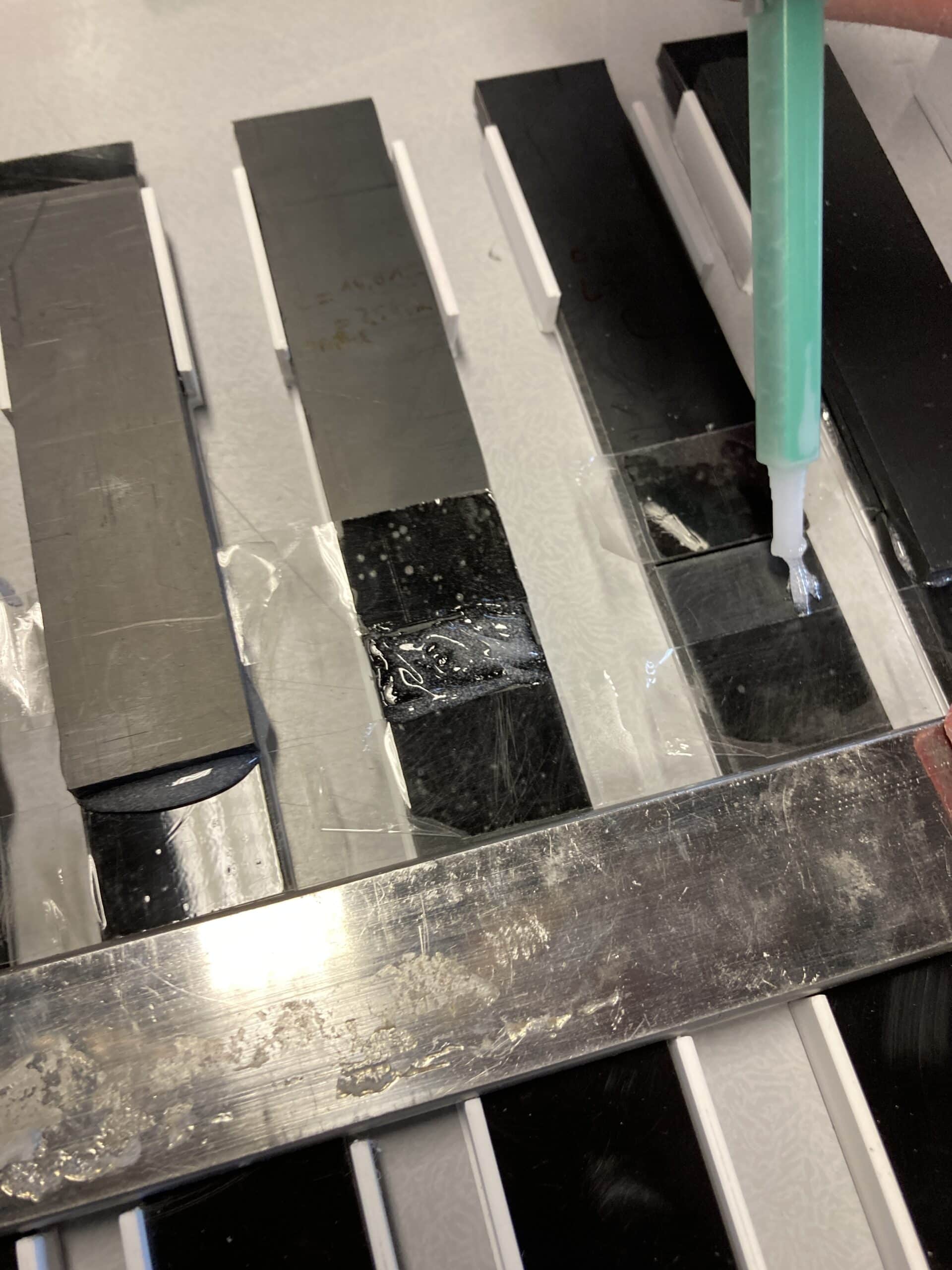 Glueing of  the tensile test specimens