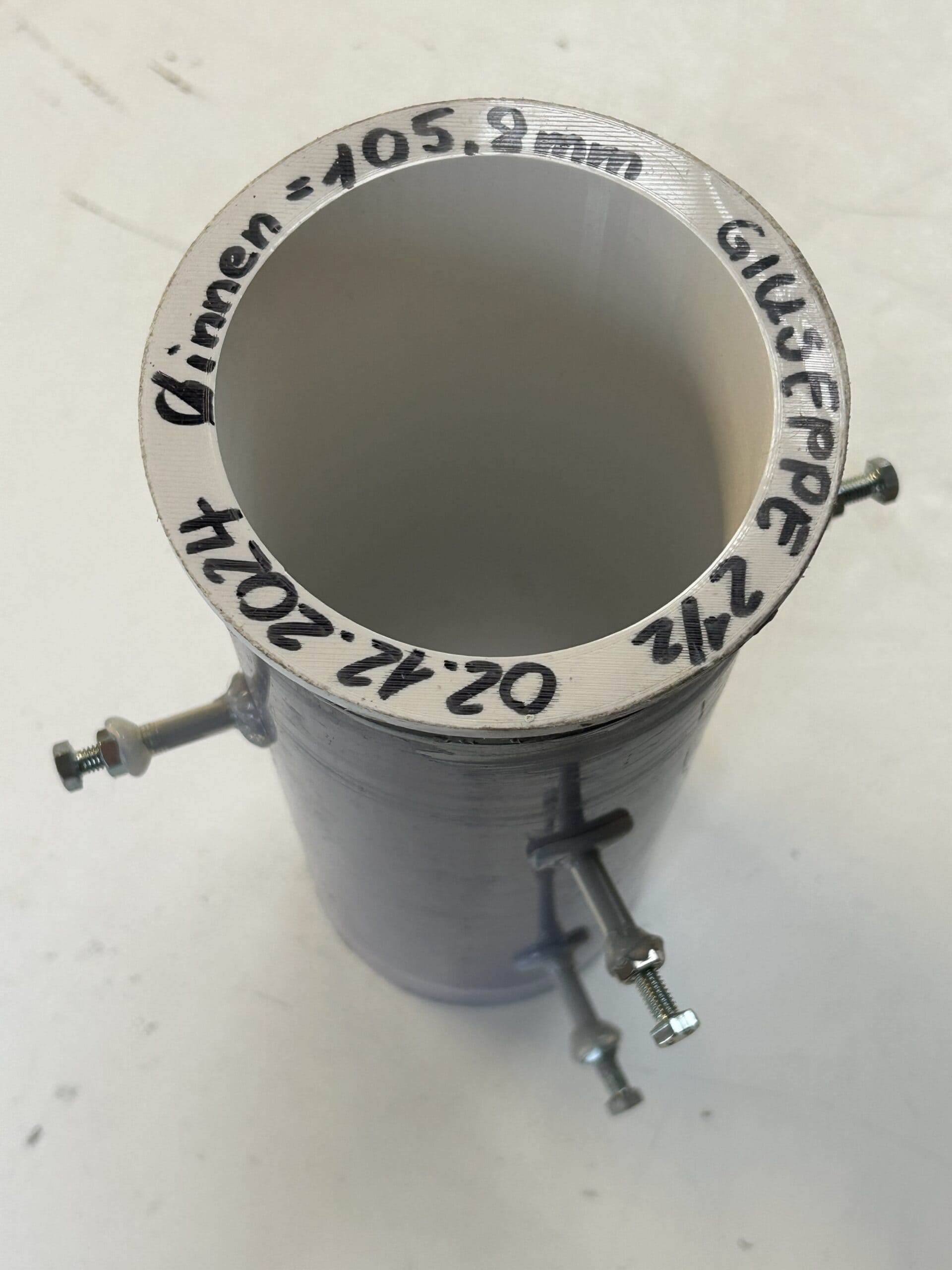 Prototype designed to inject adhesive into the gap behind the pipe for secure bonding